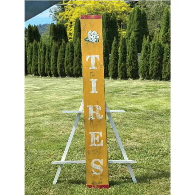 Photo of the White Rose Tires hand-painted wood board