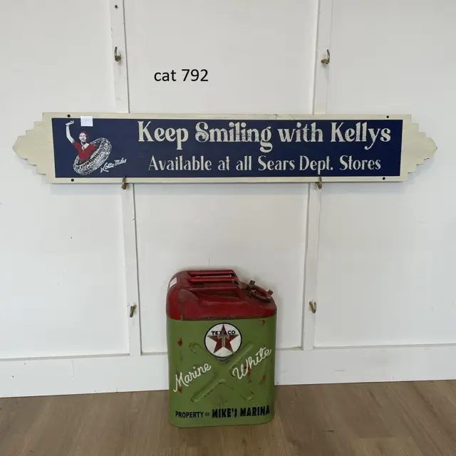 Keep Smiling With Kellys Tires Hand Painted Wood Sign