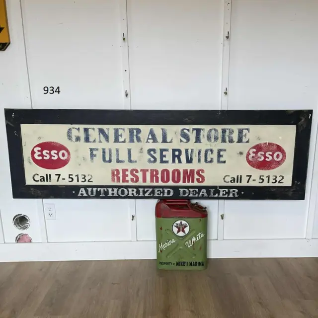 Photo of the Esso General Store hand-painted wood board